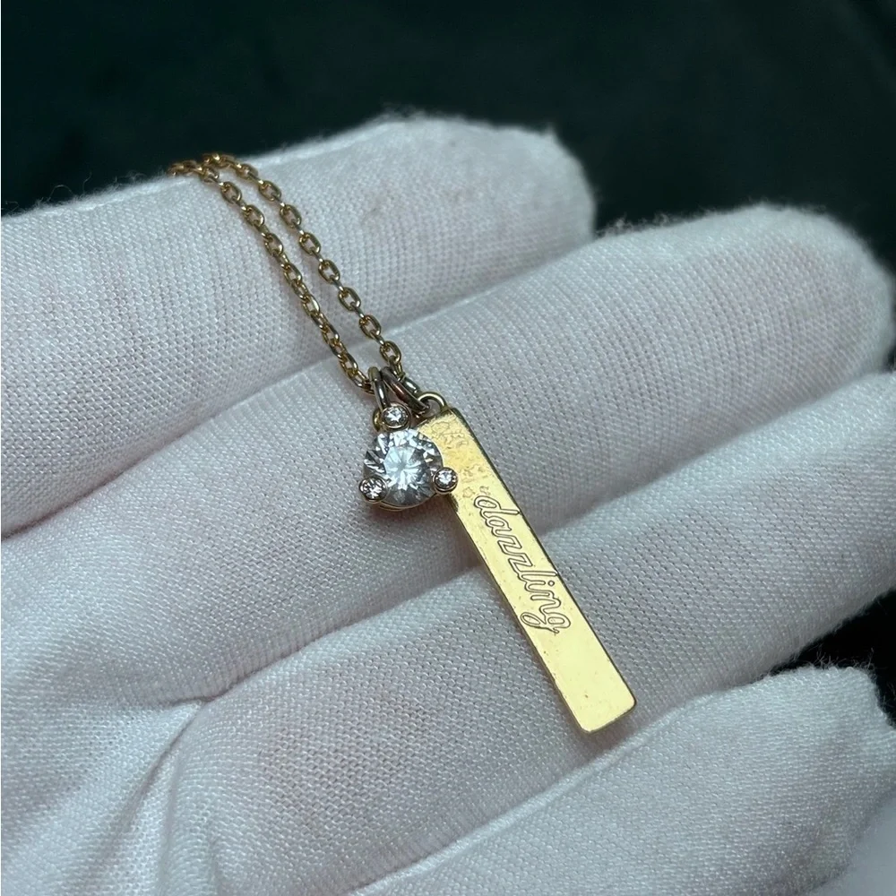 Kate Spade New York April Born to Be Dazzling Gold-Tone Bar Pendant Necklace - Picture 2 of 9